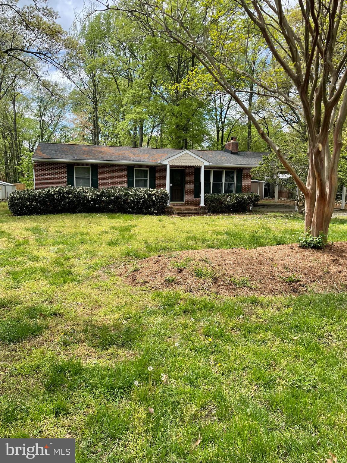 3460 Cohasset Avenue Annapolis, MD 21403 - Photo 2 of 29 a front view of a house with a garden