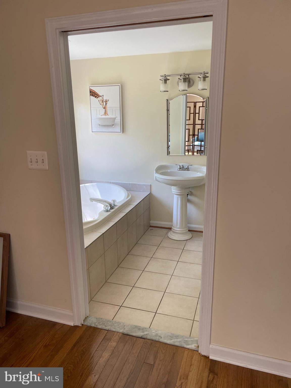 3460 Cohasset Avenue Annapolis, MD 21403 - Photo 22 of 29 a bathroom with a sink a toilet and mirror