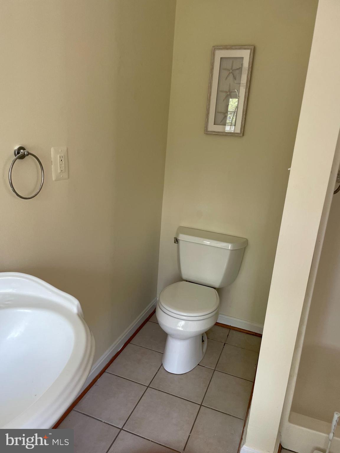 3460 Cohasset Avenue Annapolis, MD 21403 - Photo 24 of 29 a bathroom with a toilet and a sink