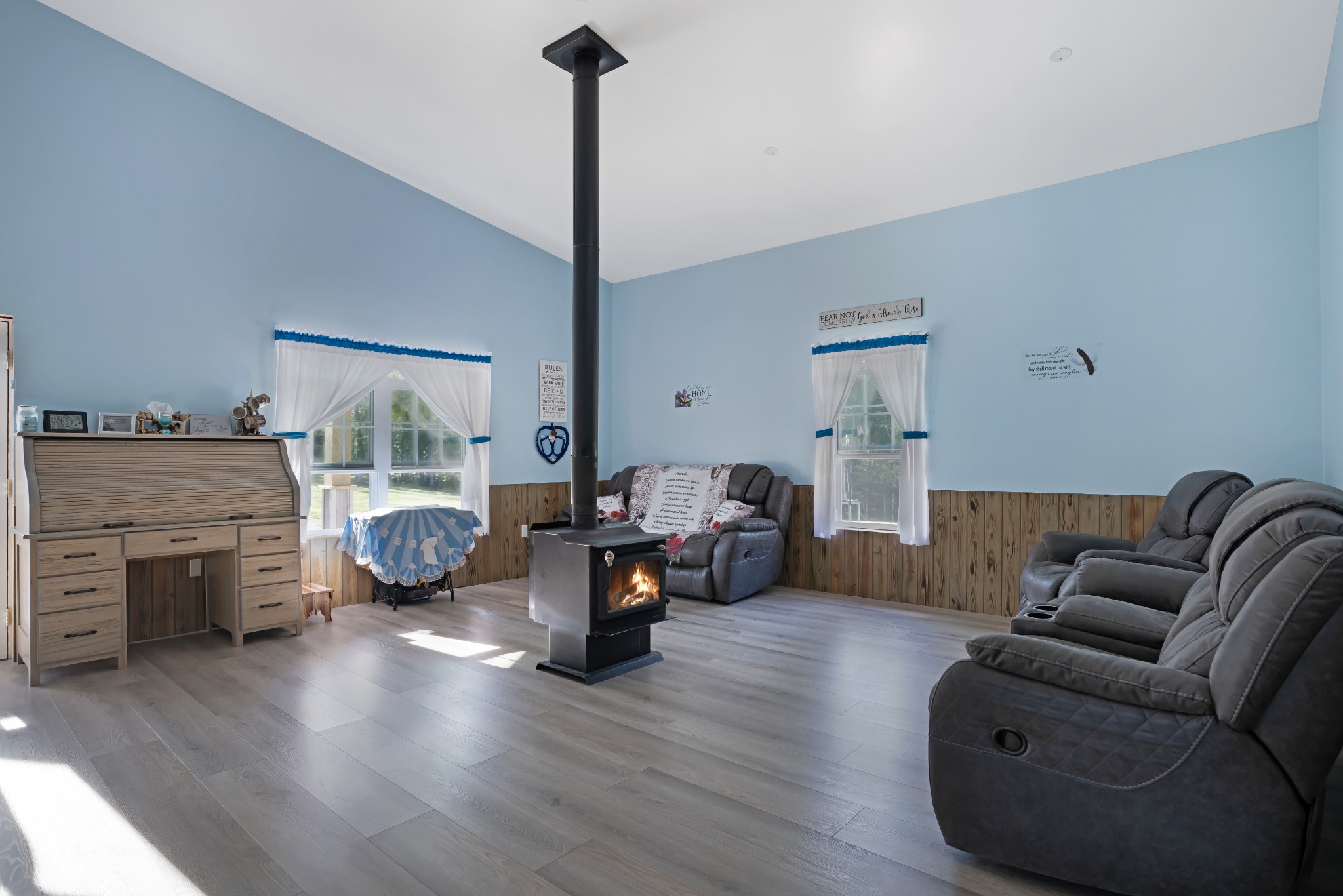 1779 Mt Zion Road Big Sandy, TN 38221 - Photo 6 of 31 a living room with furniture and a wooden floor