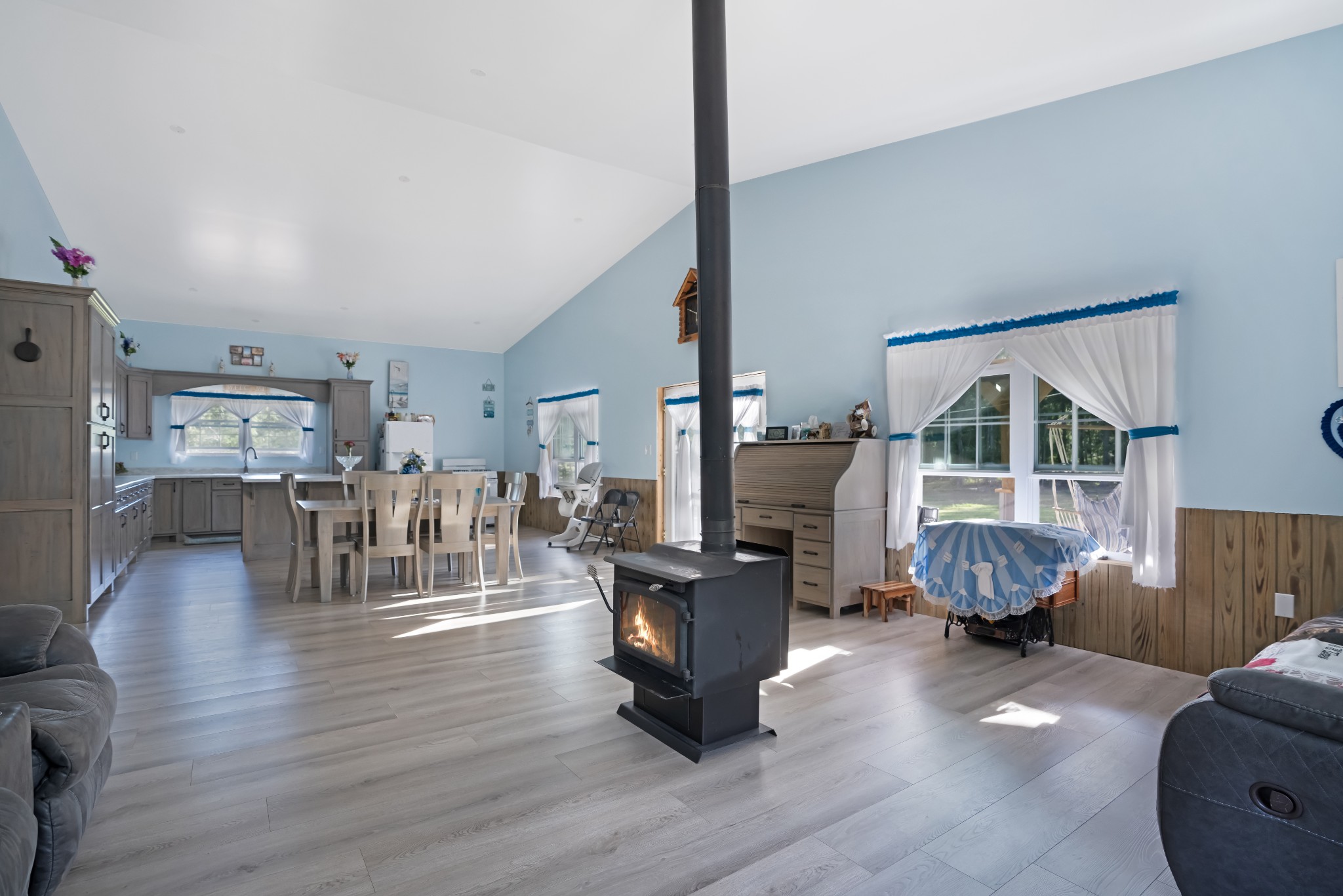 1779 Mt Zion Road Big Sandy, TN 38221 - Photo 8 of 31 a living room with furniture and a wooden floor