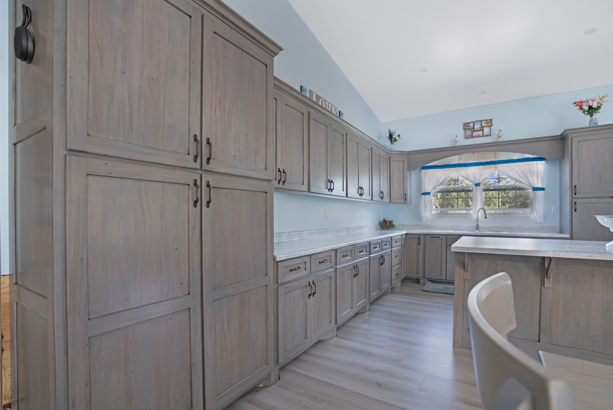 1779 Mt Zion Road Big Sandy, TN 38221 - Photo 9 of 31 a kitchen with sink cabinets and window