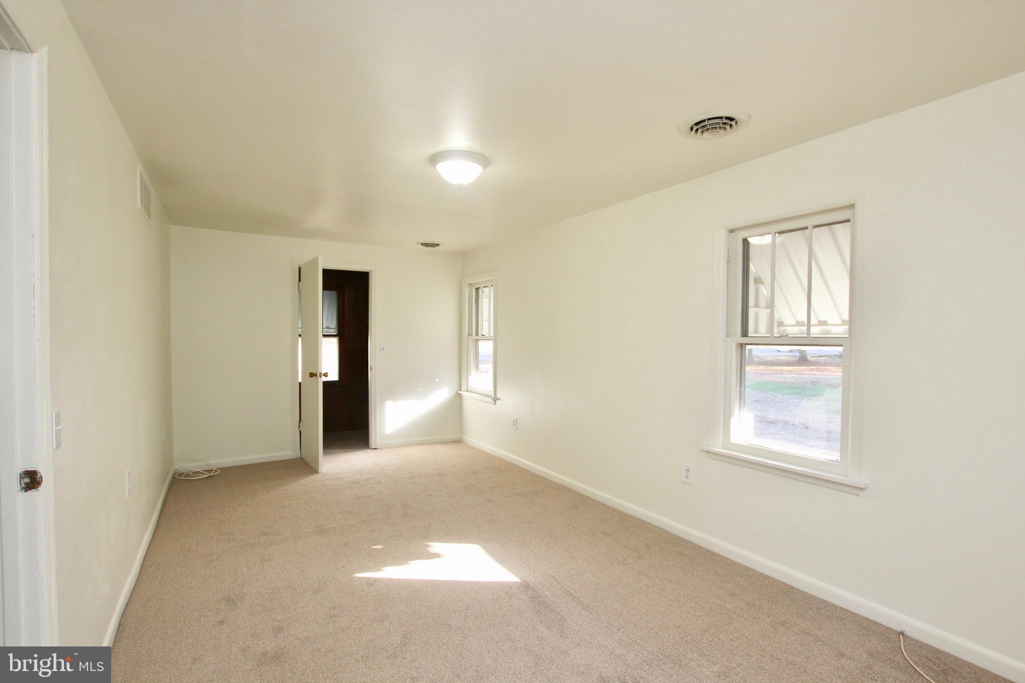 5807 Eldorado Sharptown Road Rhodesdale, MD 21659 - Photo 16 of 24 Master Bedroom with walk in closet