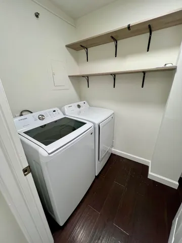 a utility room with dryer and washer