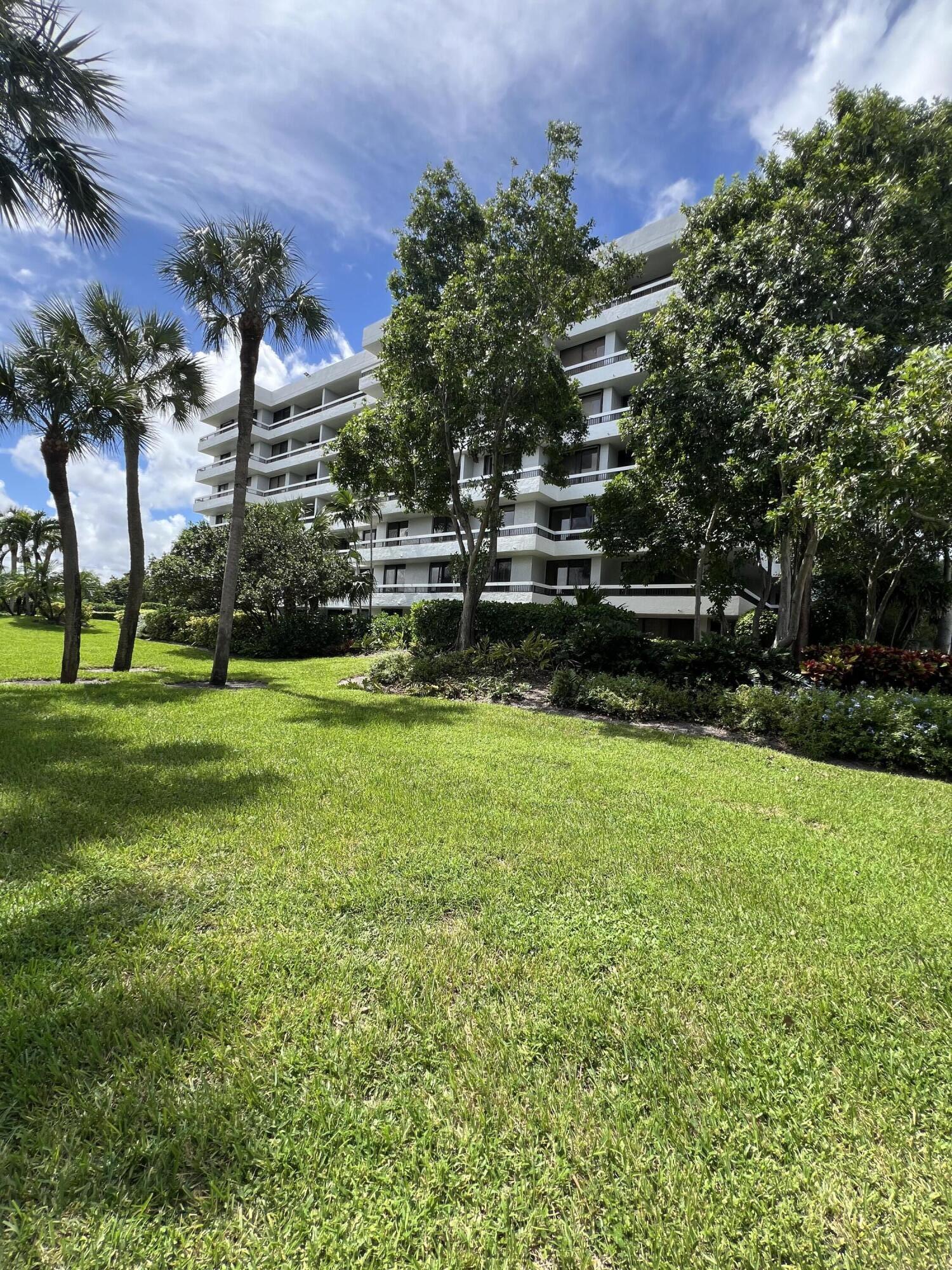 23200 Camino Del Mar, Unit 303 Boca Raton, FL 33433 - Photo 25 of 33 a view of a park with large trees