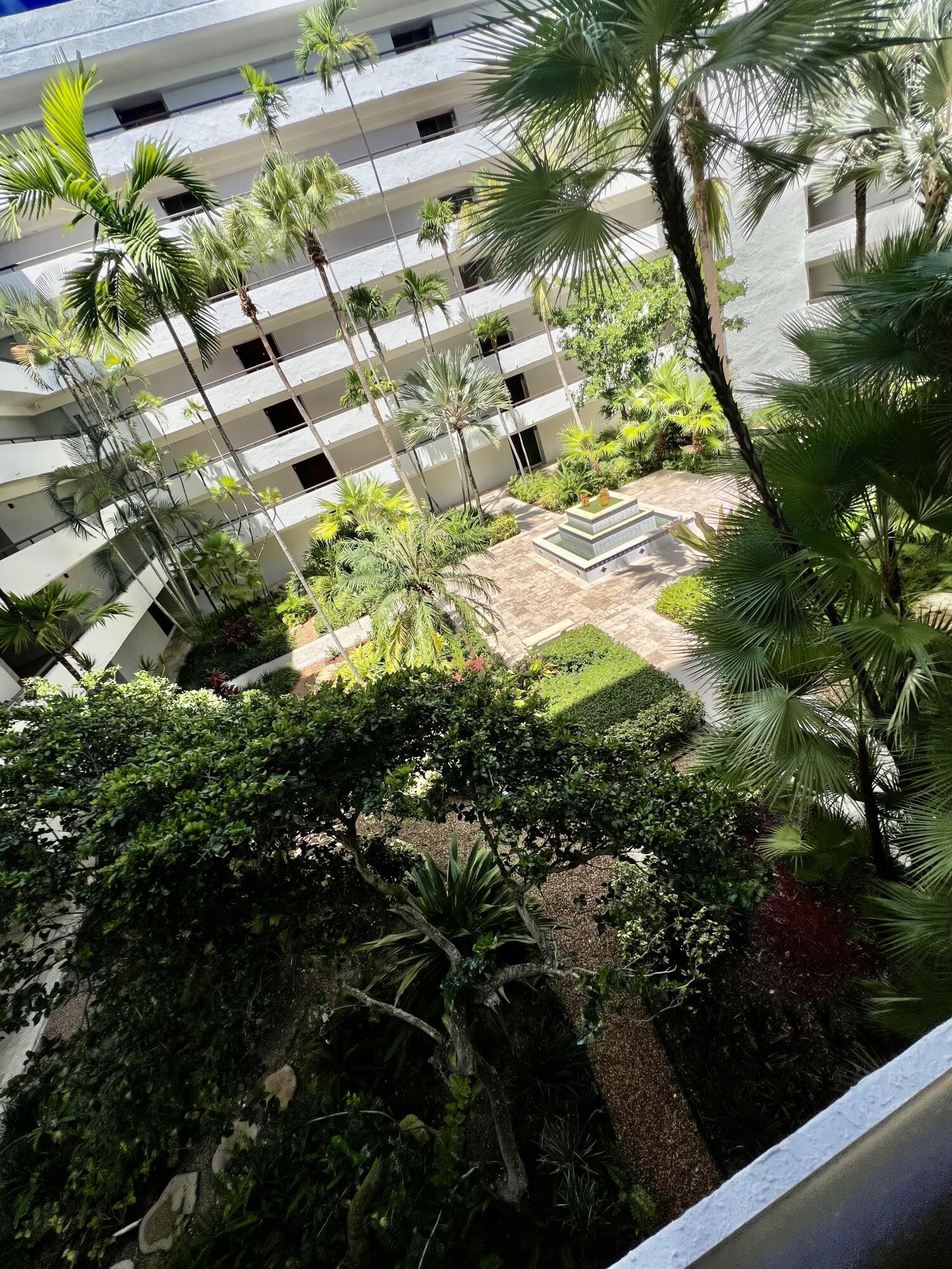 23200 Camino Del Mar, Unit 303 Boca Raton, FL 33433 - Photo 27 of 33 a picture of flowers