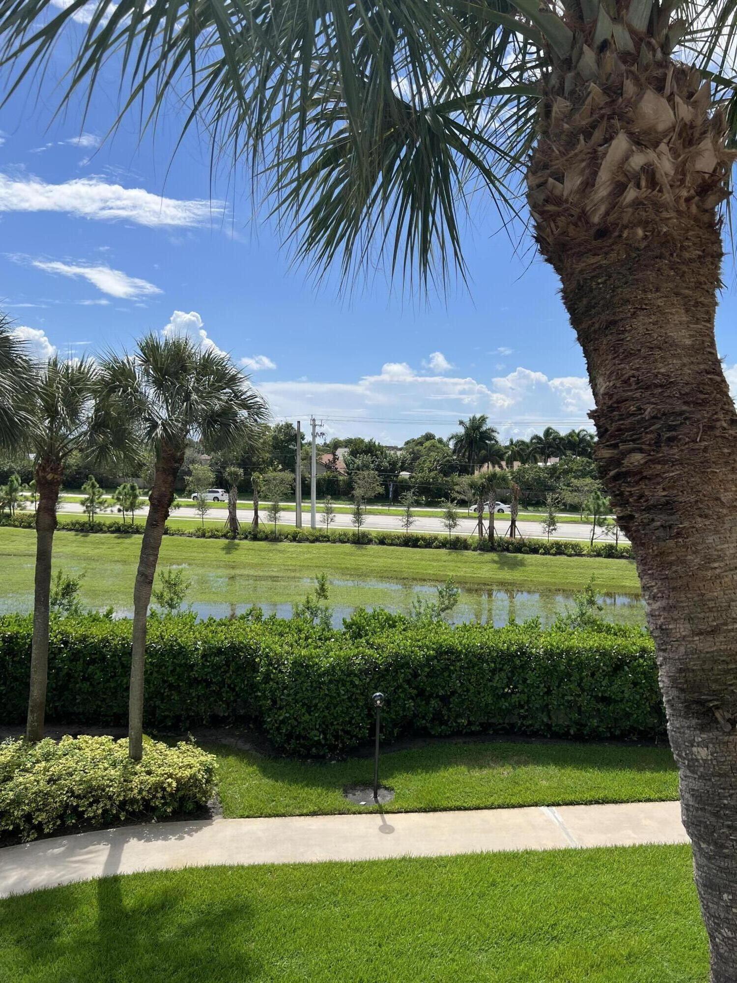 23200 Camino Del Mar, Unit 303 Boca Raton, FL 33433 - Photo 32 of 33 a view of a garden