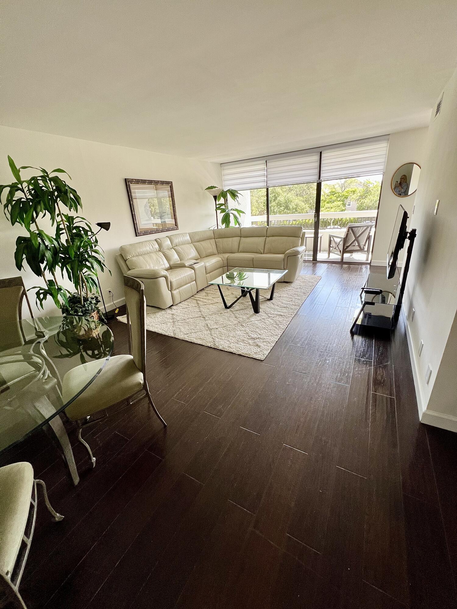 23200 Camino Del Mar, Unit 303 Boca Raton, FL 33433 - Photo 7 of 33 a living room with furniture