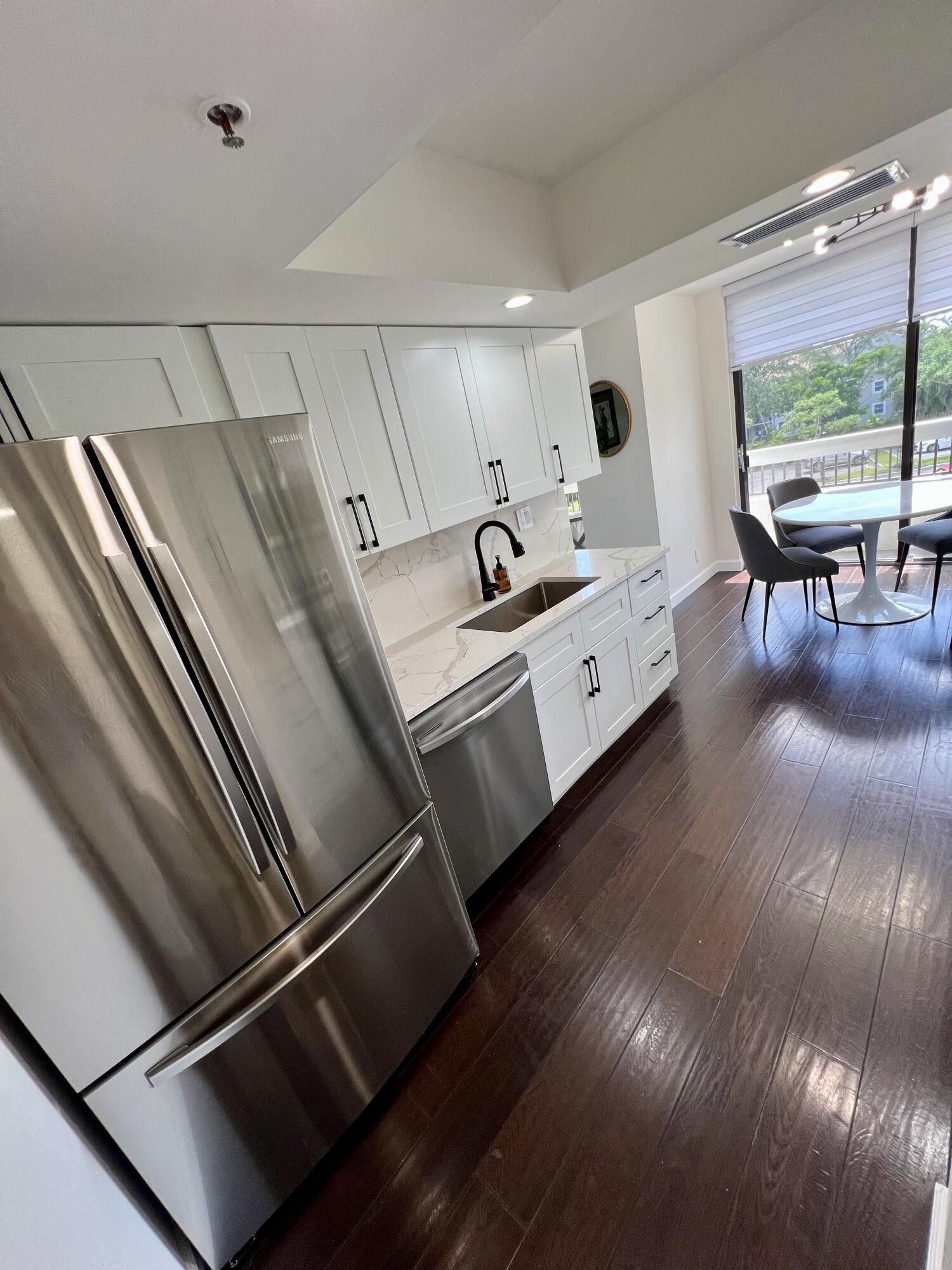 23200 Camino Del Mar, Unit 303 Boca Raton, FL 33433 - Photo 9 of 33 a living room with furniture