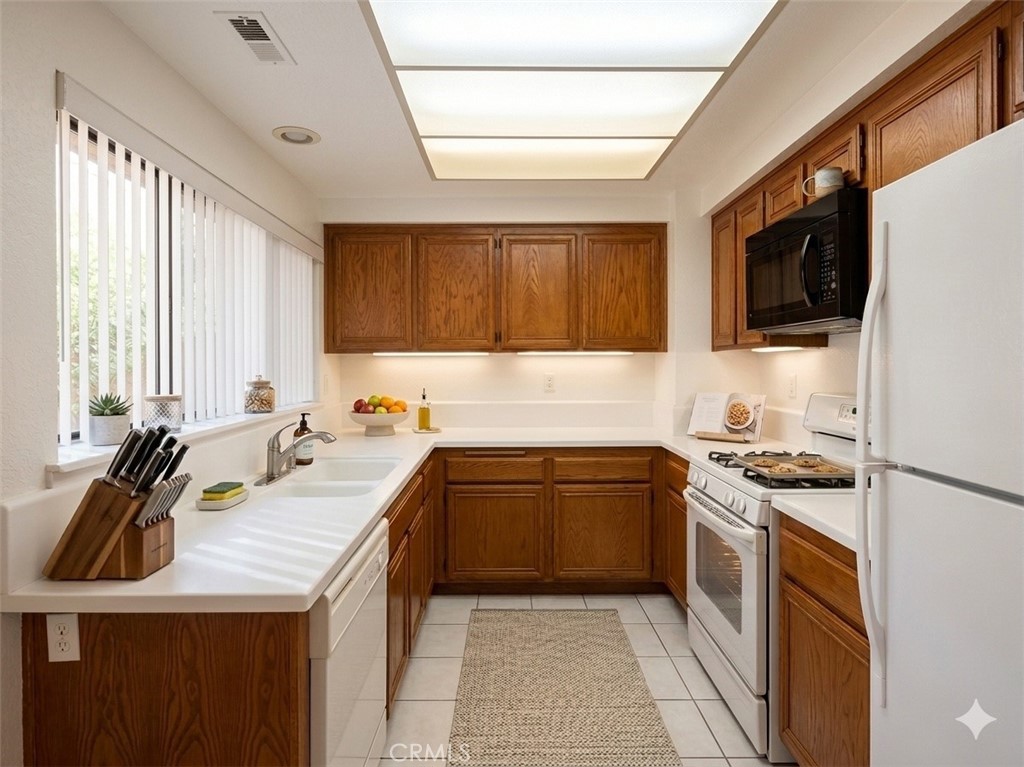 17 Rock Cliff Place Phillips Ranch, CA 91766 - Photo 16 of 38 Staged (AI) kitchen