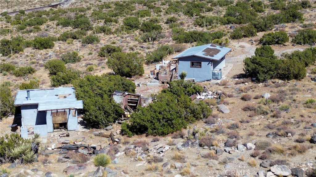 1 Silver Creek Road Lucerne Valley, CA 92356 - Photo 10 of 12 an aerial view of a house with a yard