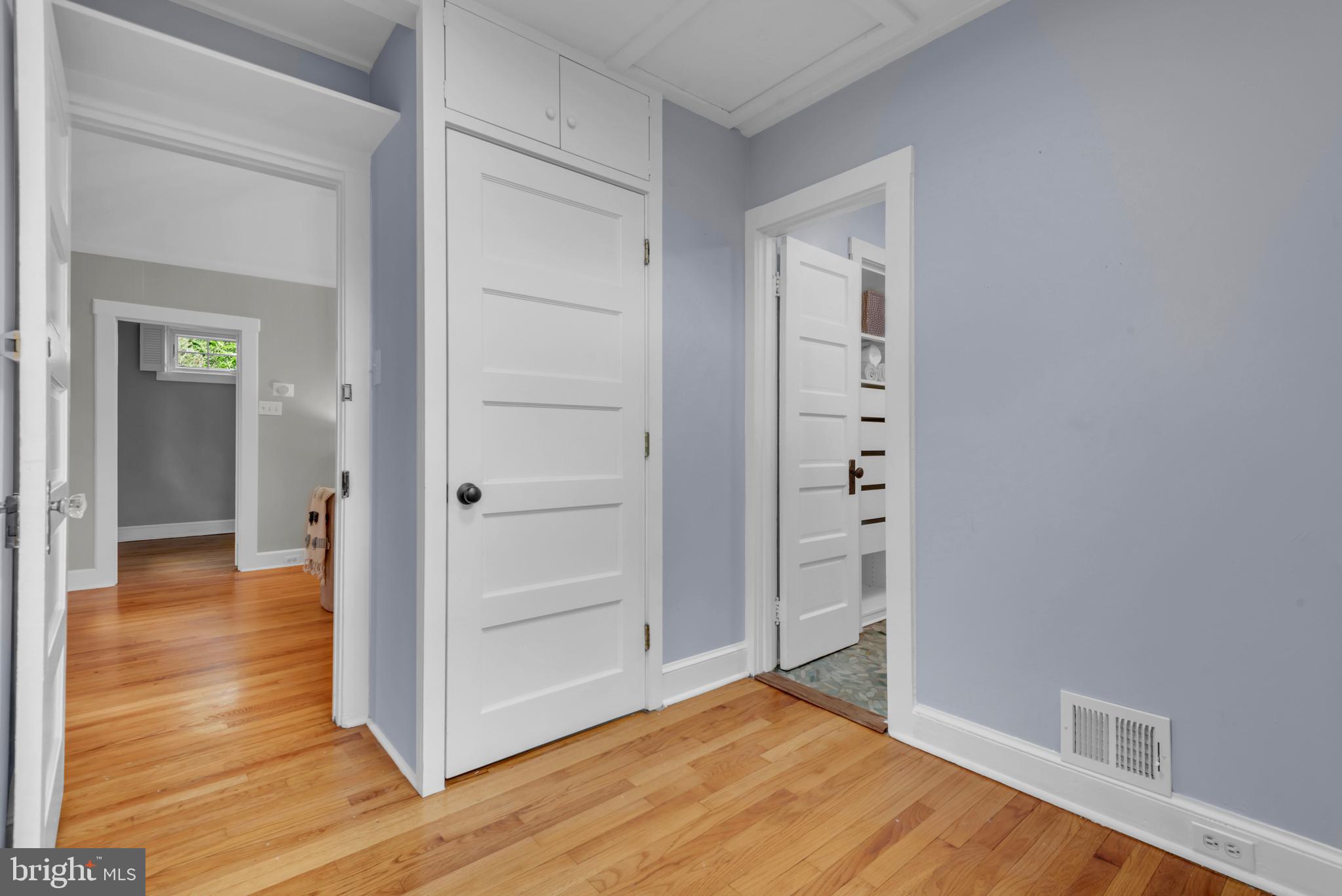 155 Ridgeway Circle Arnold, MD 21012 - Photo 33 of 73 a view of a hallway with wooden floor