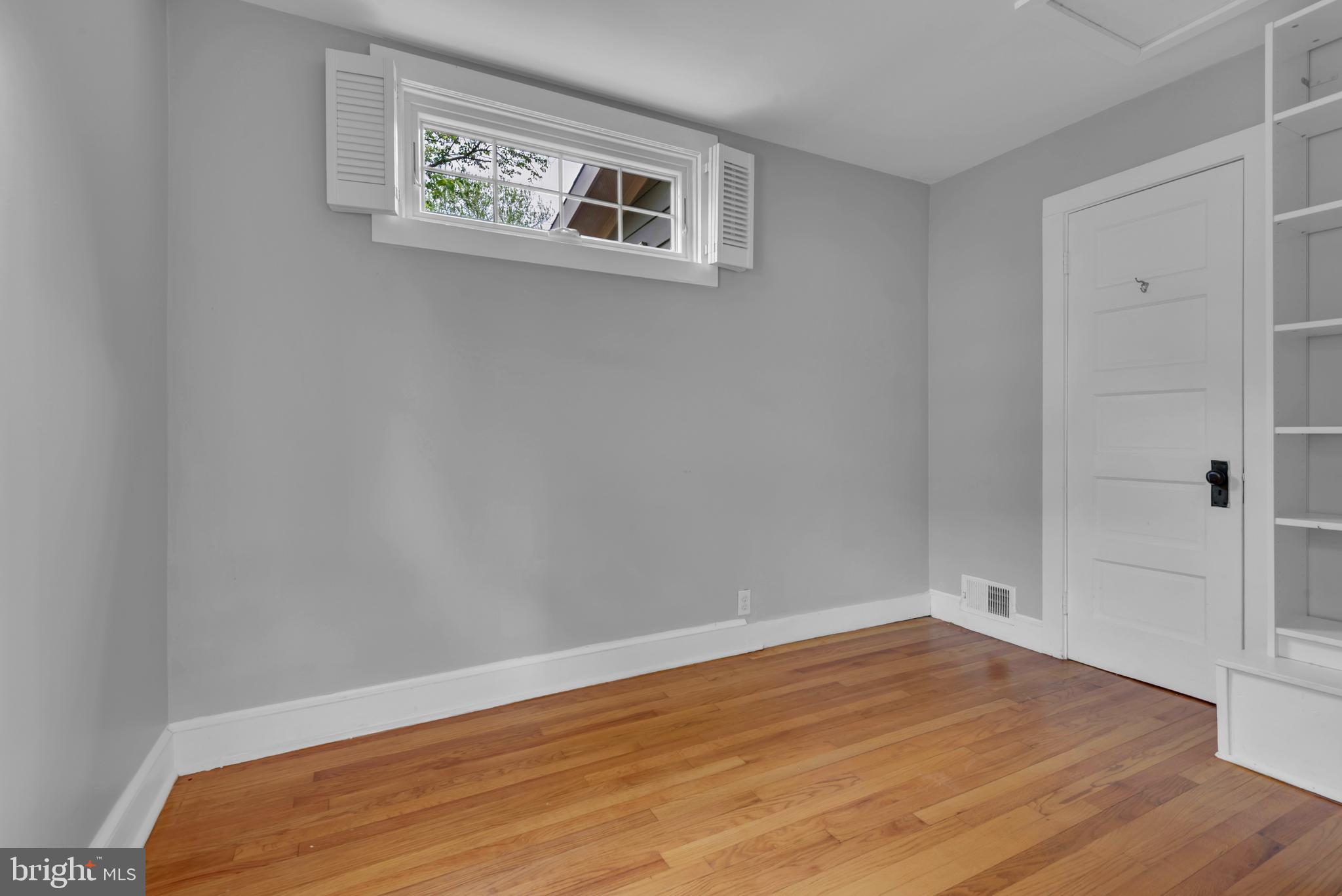 155 Ridgeway Circle Arnold, MD 21012 - Photo 36 of 73 a view of empty room with wooden floor
