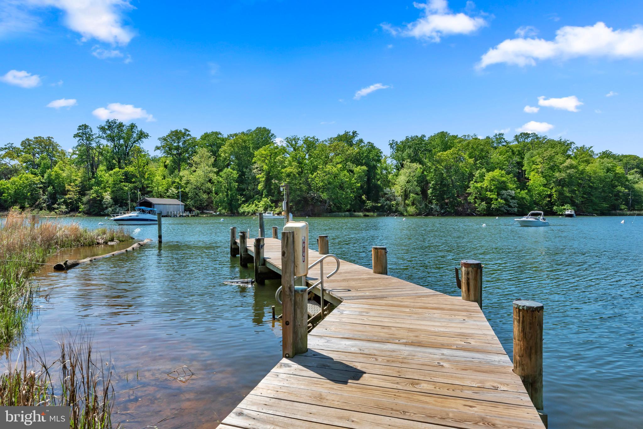 155 Ridgeway Circle Arnold, MD 21012 - Photo 53 of 73 a view of a lake with houses