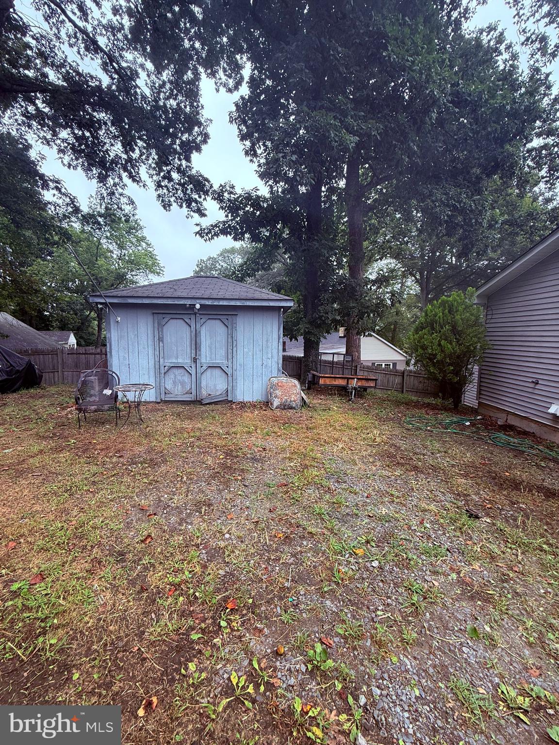 18318 Sharon Road Triangle, VA 22172 - Photo 25 of 27 a view of a house with a yard and sitting area