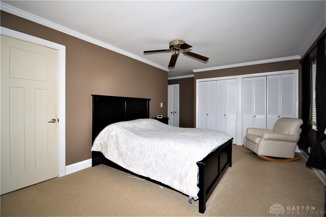 307 Ardmore Road Springfield, OH 45504 - Photo 33 of 57 Master bedroom with a master bath through door closest to us. a large walk-in closet is through door at far left