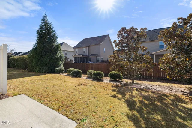 a view of a house with a snow in the background
