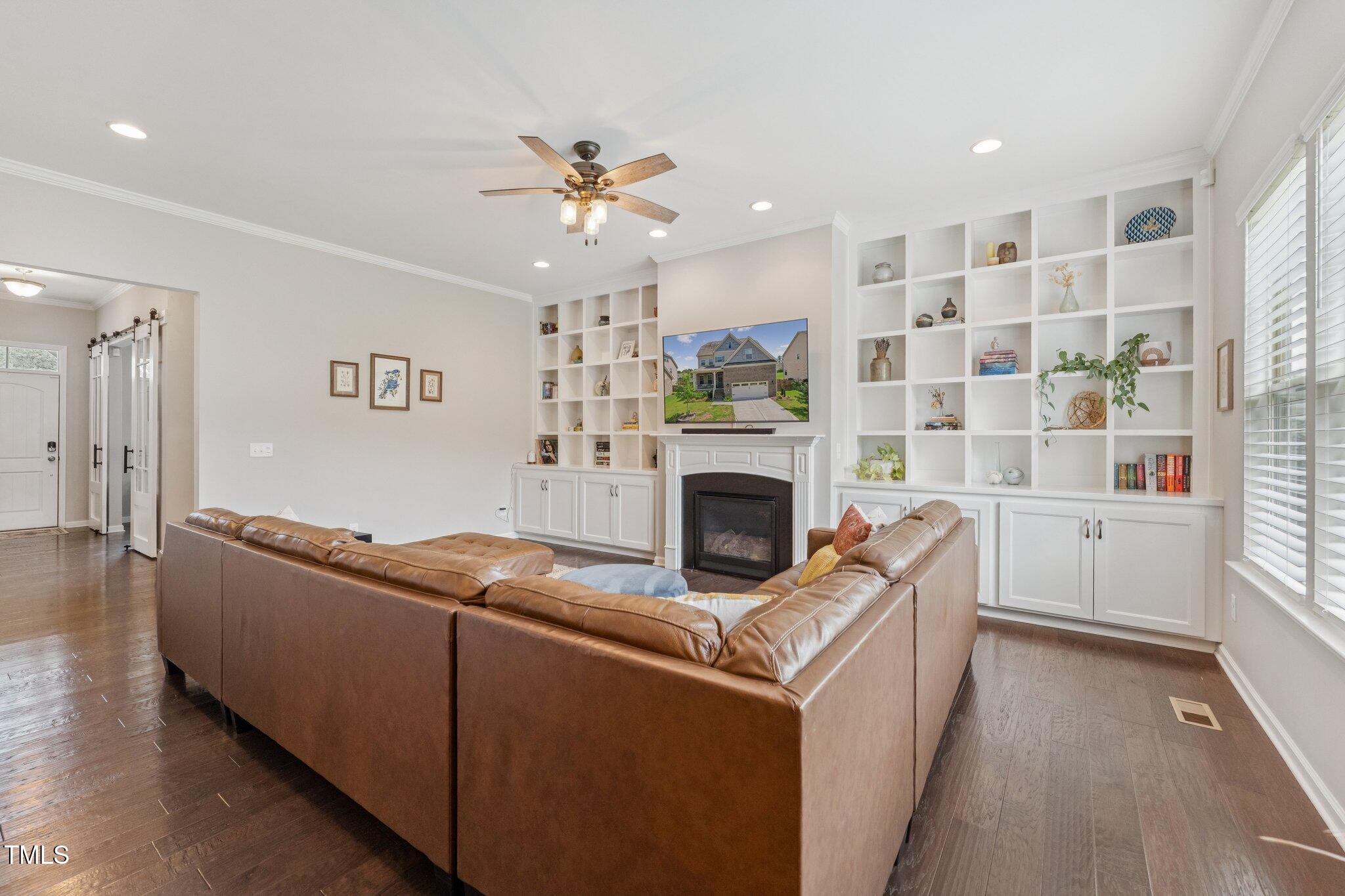 1020 Big Spring Circle Durham, NC 27703 - Photo 9 of 40 a living room with furniture and a fireplace