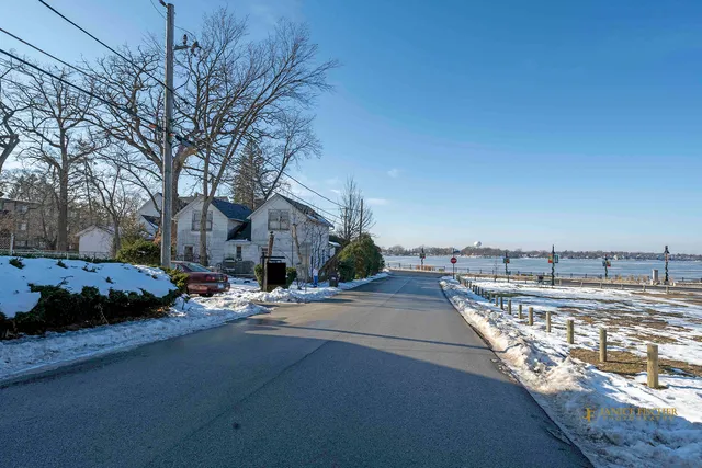 a view of a street with a house