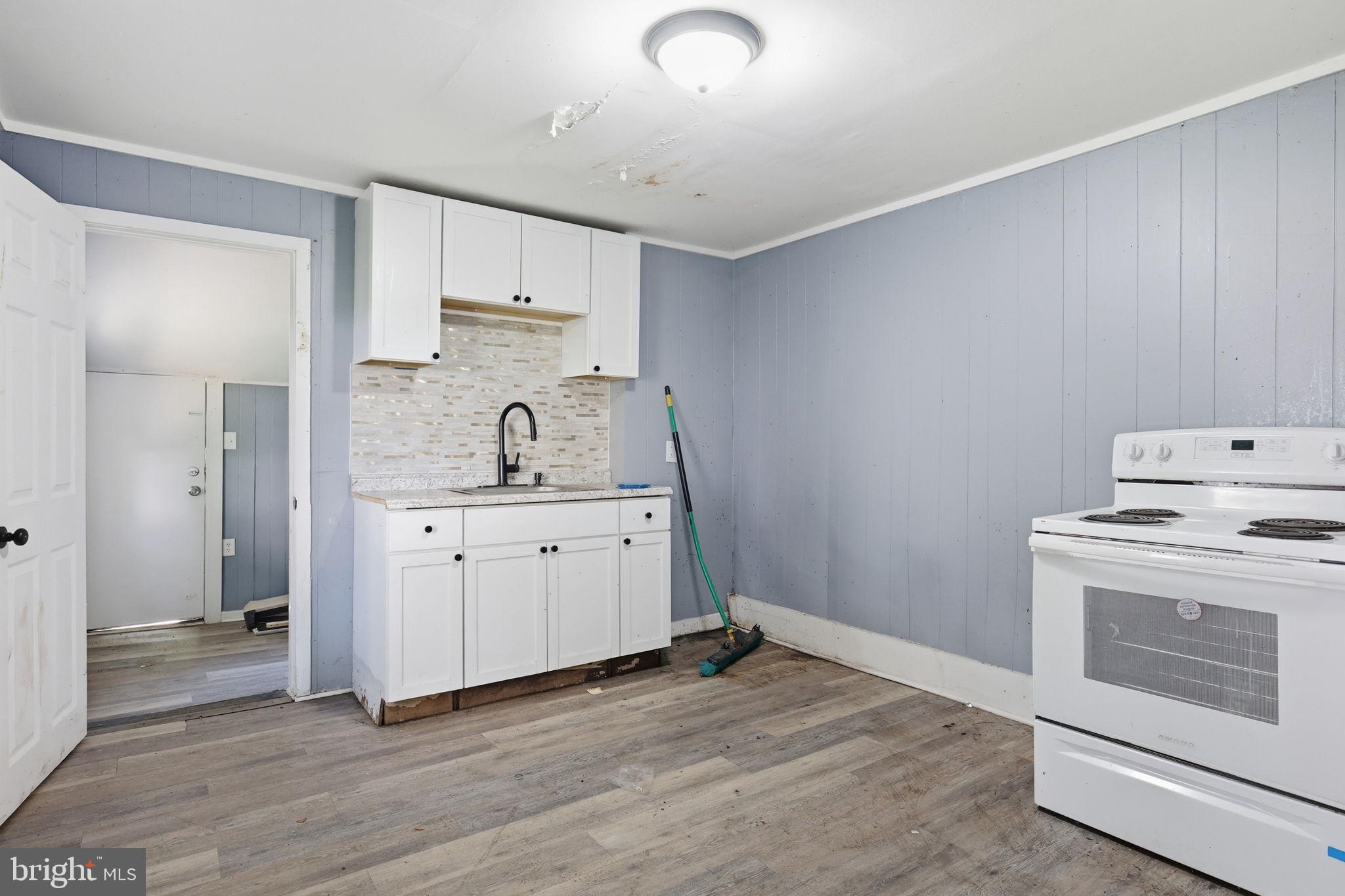 60 Walnut Street Salem, NJ 08079 - Photo 15 of 25 Cozy kitchen with modern touches.