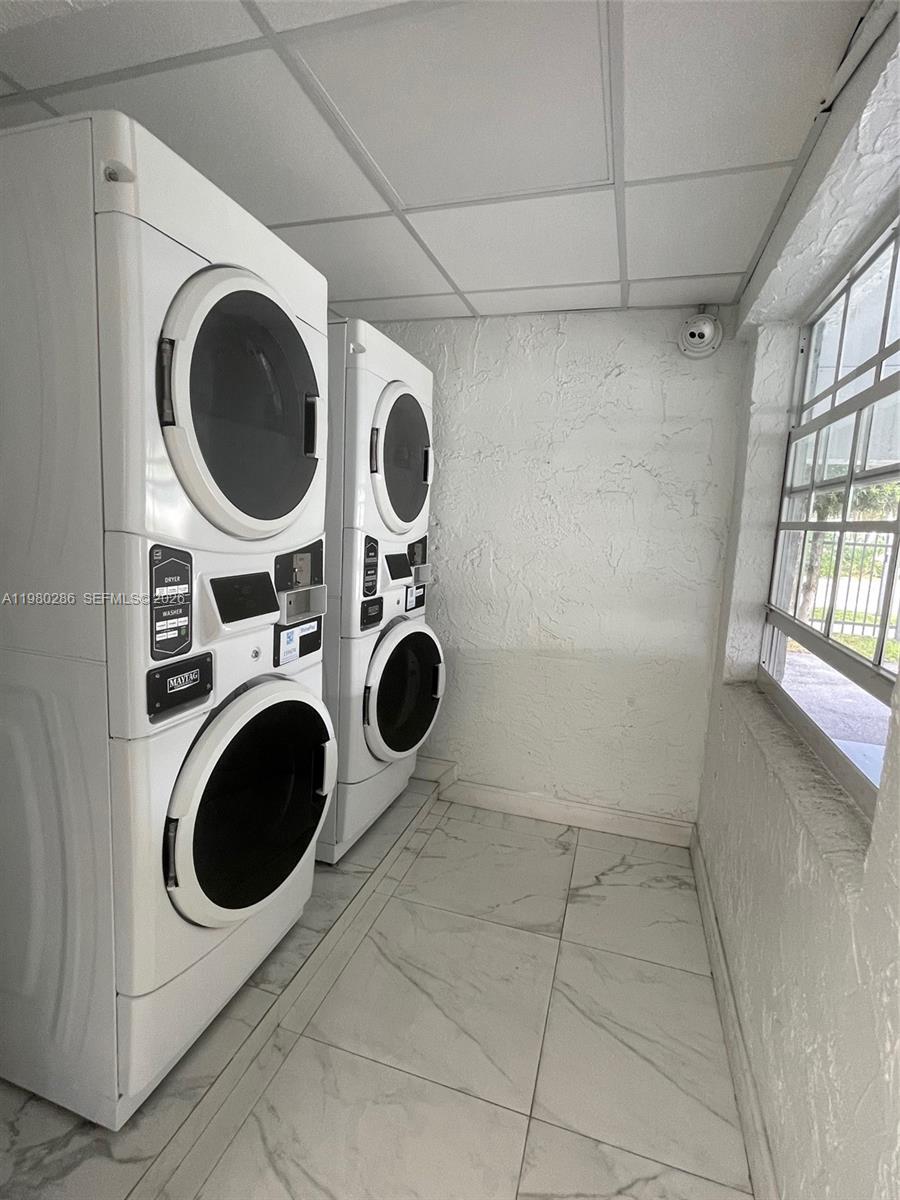 2500 Southwest 6th Street, Unit 404 Miami, FL 33135 - Photo 3 of 19 a view of washer and dryer in a utility room