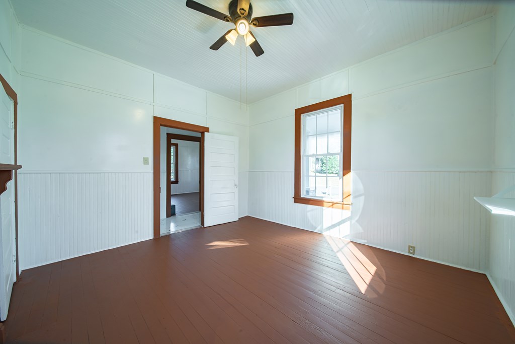 13 Perry Street Manchester, GA 31816 - Photo 12 of 24 a view of a big room with windows and cabinet