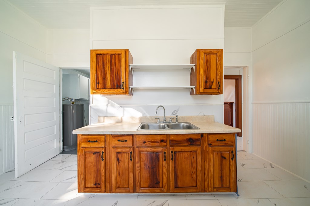 13 Perry Street Manchester, GA 31816 - Photo 22 of 24 a bathroom with a sink and a mirror
