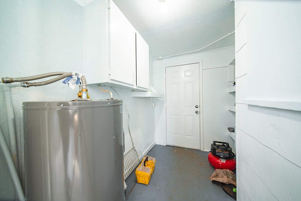 13 Perry Street Manchester, GA 31816 - Photo 23 of 24 a kitchen with refrigerator and window