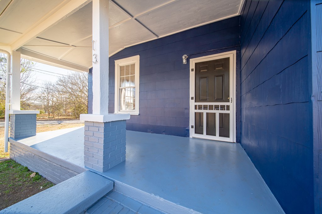 13 Perry Street Manchester, GA 31816 - Photo 24 of 24 a view of an entryway with wooden floor and door