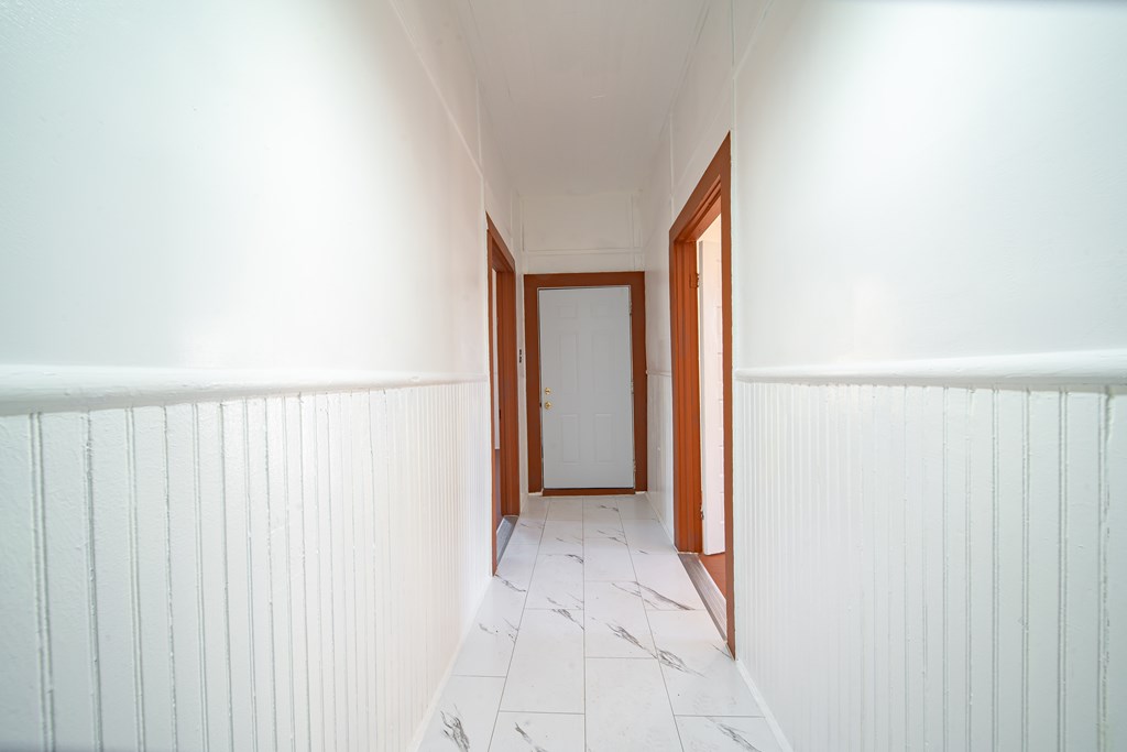 13 Perry Street Manchester, GA 31816 - Photo 8 of 24 a view of a room with a hallway