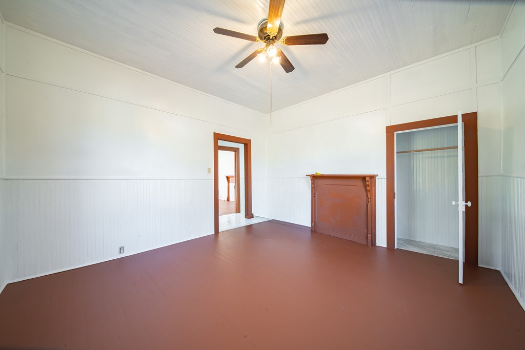 13 Perry Street Manchester, GA 31816 - Photo 10 of 24 an empty room with closet and windows