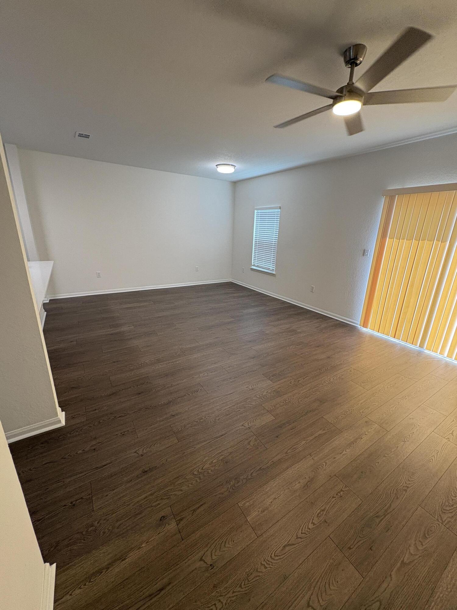 1014 Airport Road, Unit 138 Destin, FL 32541 - Photo 8 of 21 a view of an empty room and window