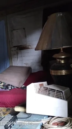 a stove top oven sitting inside of a kitchen
