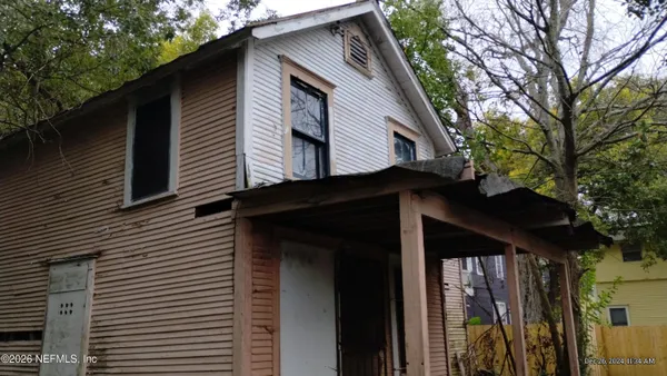 a view of a house with a large windows