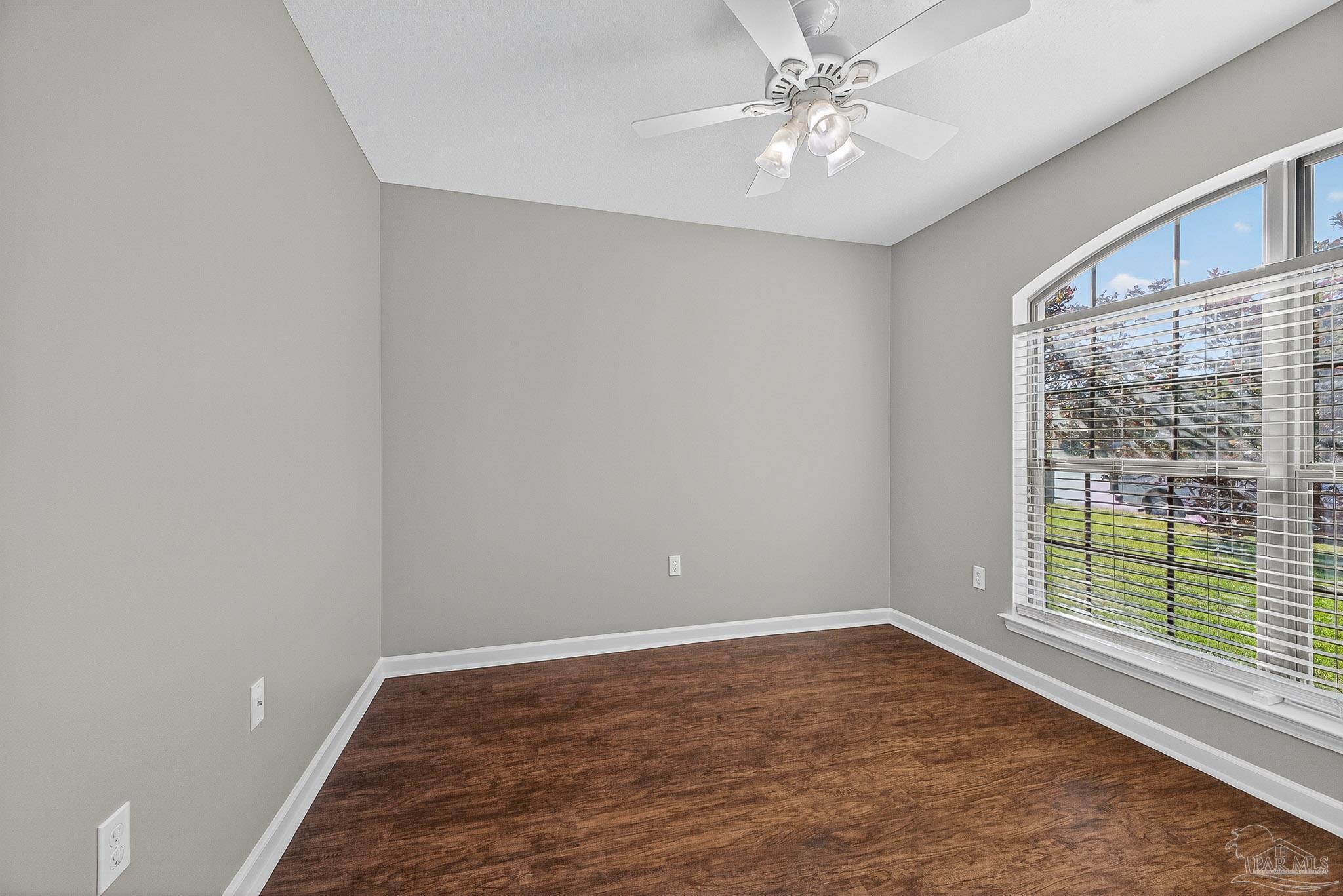 272 Millet Circle Cantonment, FL 32533 - Photo 34 of 57 wooden floor in an empty room with a window