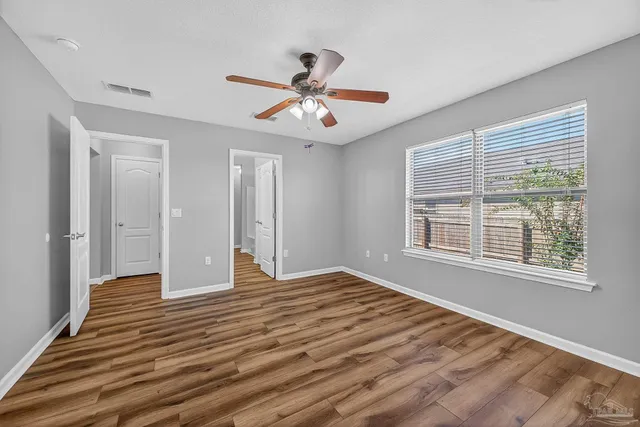 a view of a room with racks on the wall