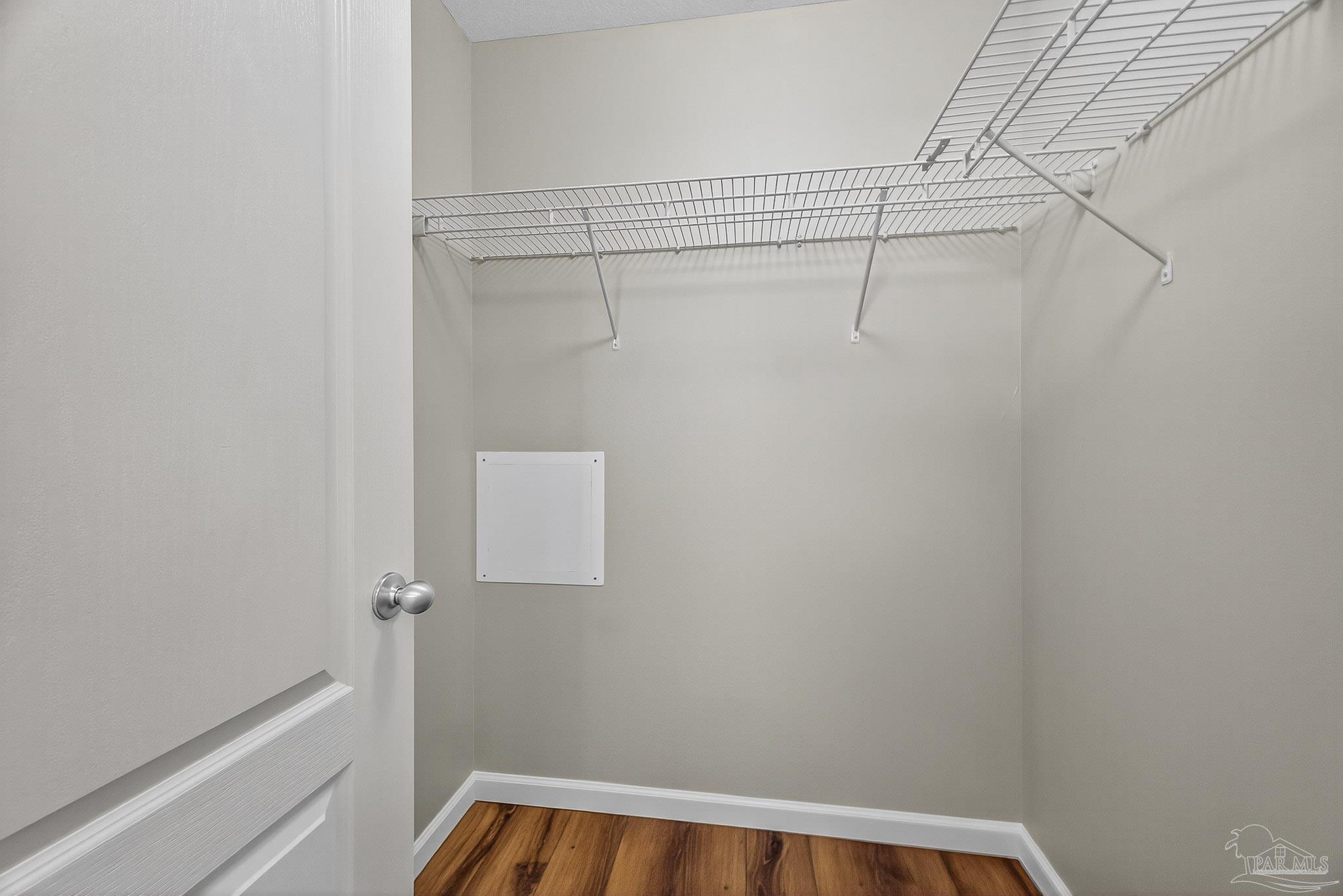 272 Millet Circle Cantonment, FL 32533 - Photo 45 of 57 a view of a room with racks on the wall