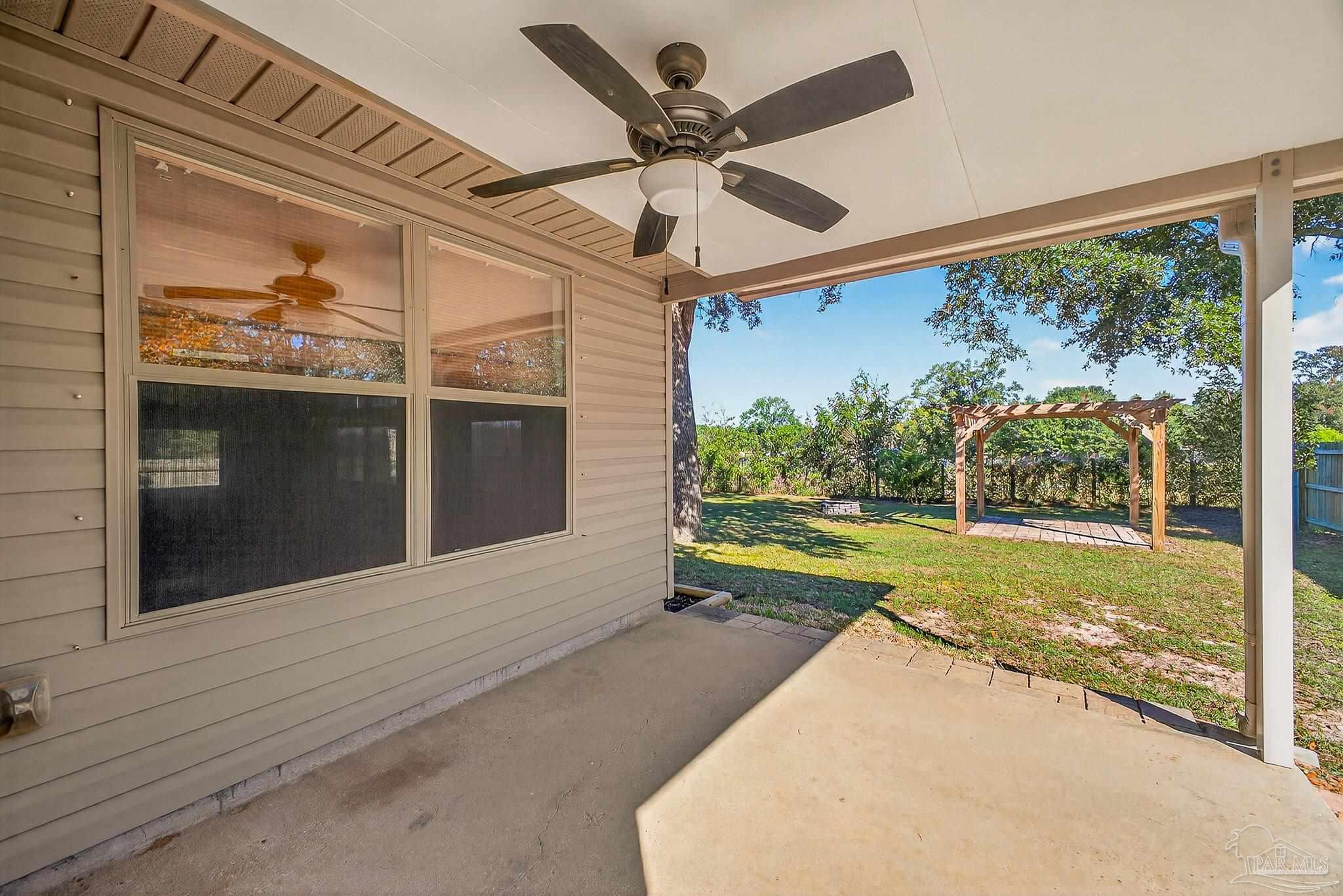 272 Millet Circle Cantonment, FL 32533 - Photo 47 of 57 a view of swimming pool with a yard