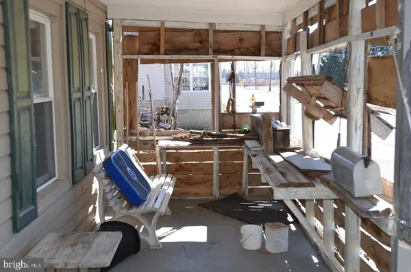 a room with gym equipment and a large window