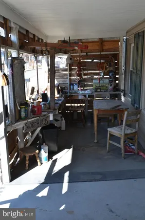 a living room with patio furniture