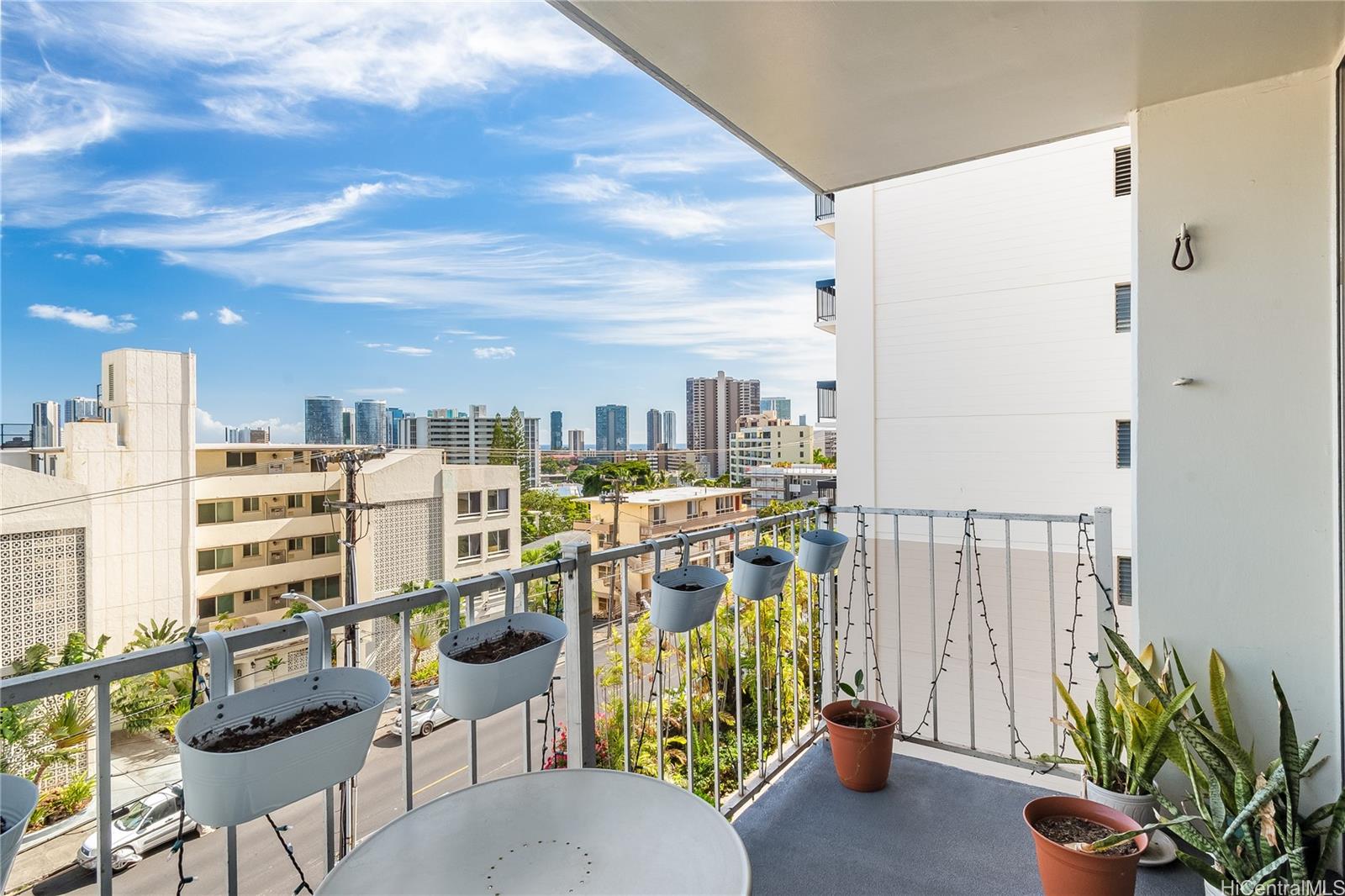 1069 Spencer Street, Unit 402 Honolulu, HI 96822 - Photo 13 of 16 a city view with tall buildings