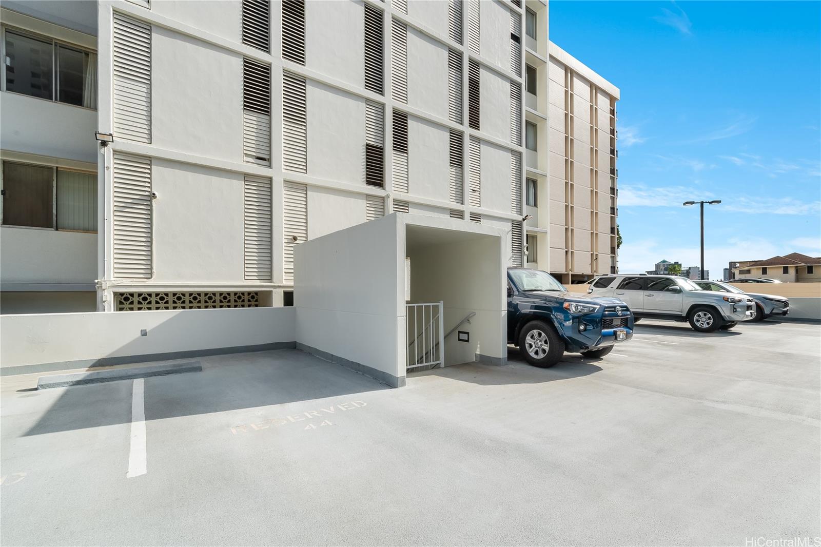 1069 Spencer Street, Unit 402 Honolulu, HI 96822 - Photo 14 of 16 a view of a street with cars