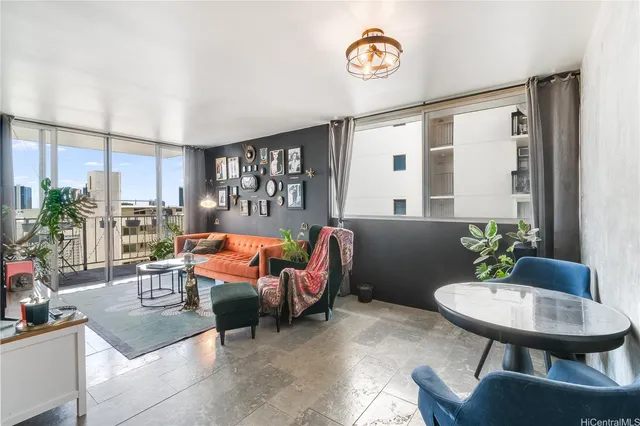 a living room with furniture and a table
