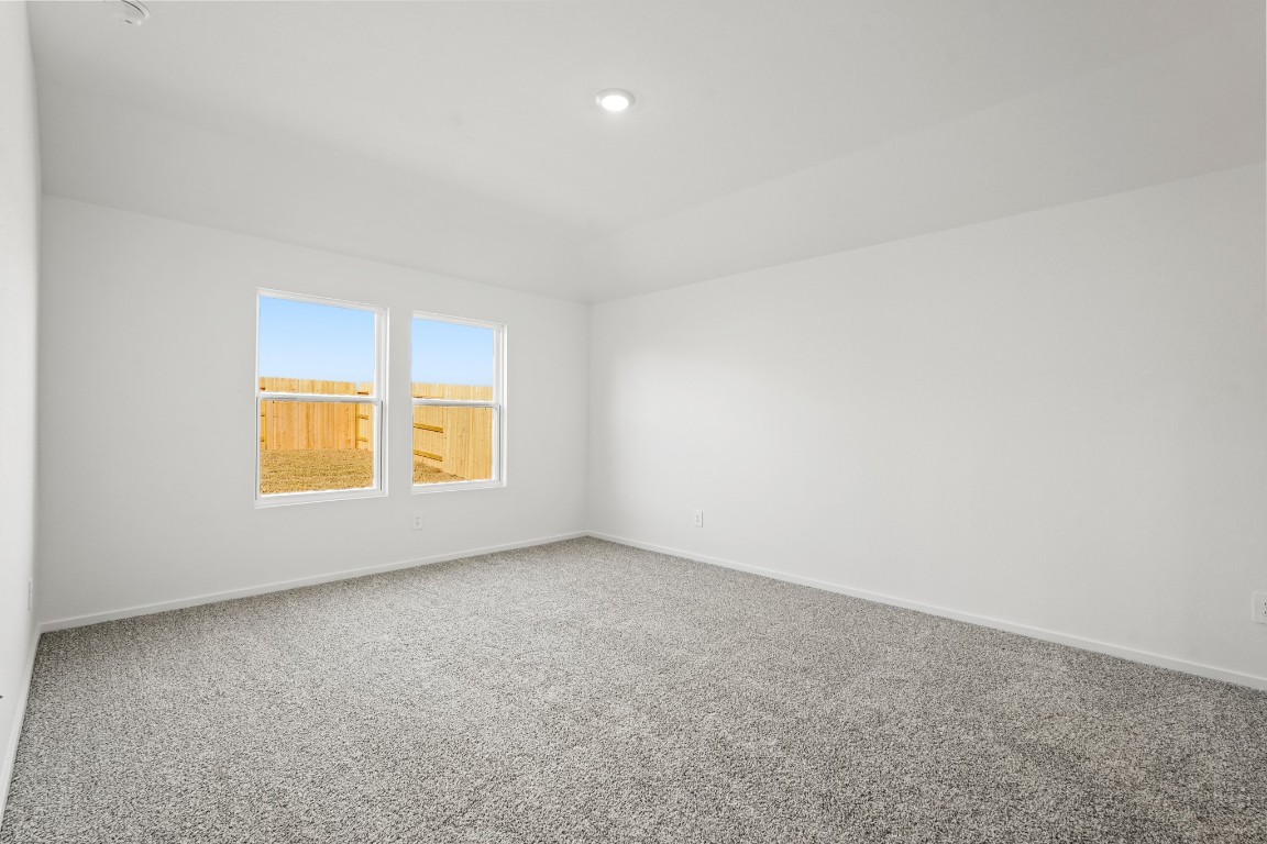 525 Wax Myrtle Way Hockley, TX 77447 - Photo 15 of 20 a view of an empty room with a window