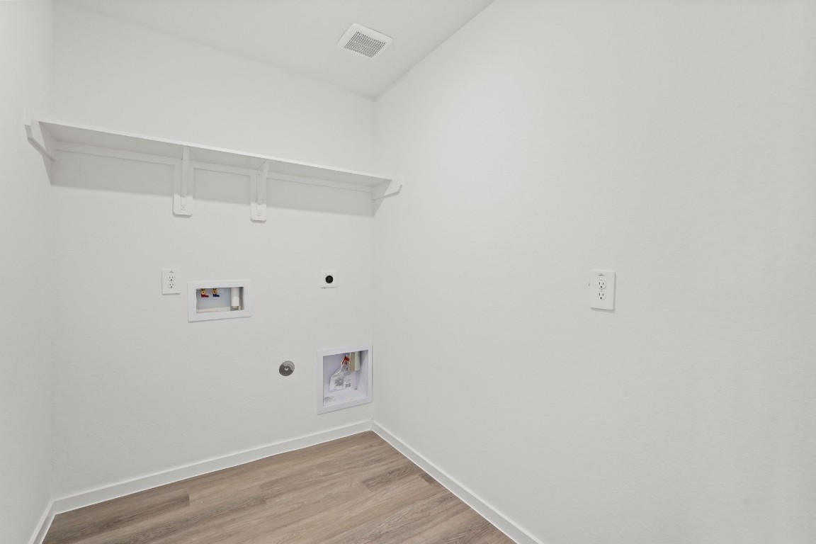 525 Wax Myrtle Way Hockley, TX 77447 - Photo 16 of 20 a view of small space with wooden floor