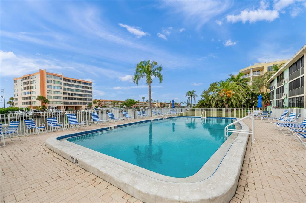 9200 Midnight Pass Road, Unit 17 Sarasota, FL 34242 - Photo 44 of 56 a view of swimming pool from a balcony