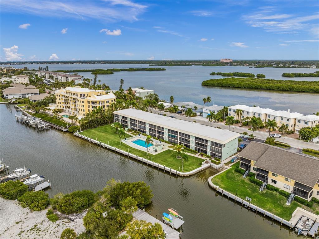 9200 Midnight Pass Road, Unit 17 Sarasota, FL 34242 - Photo 5 of 56 a view of a city with an ocean