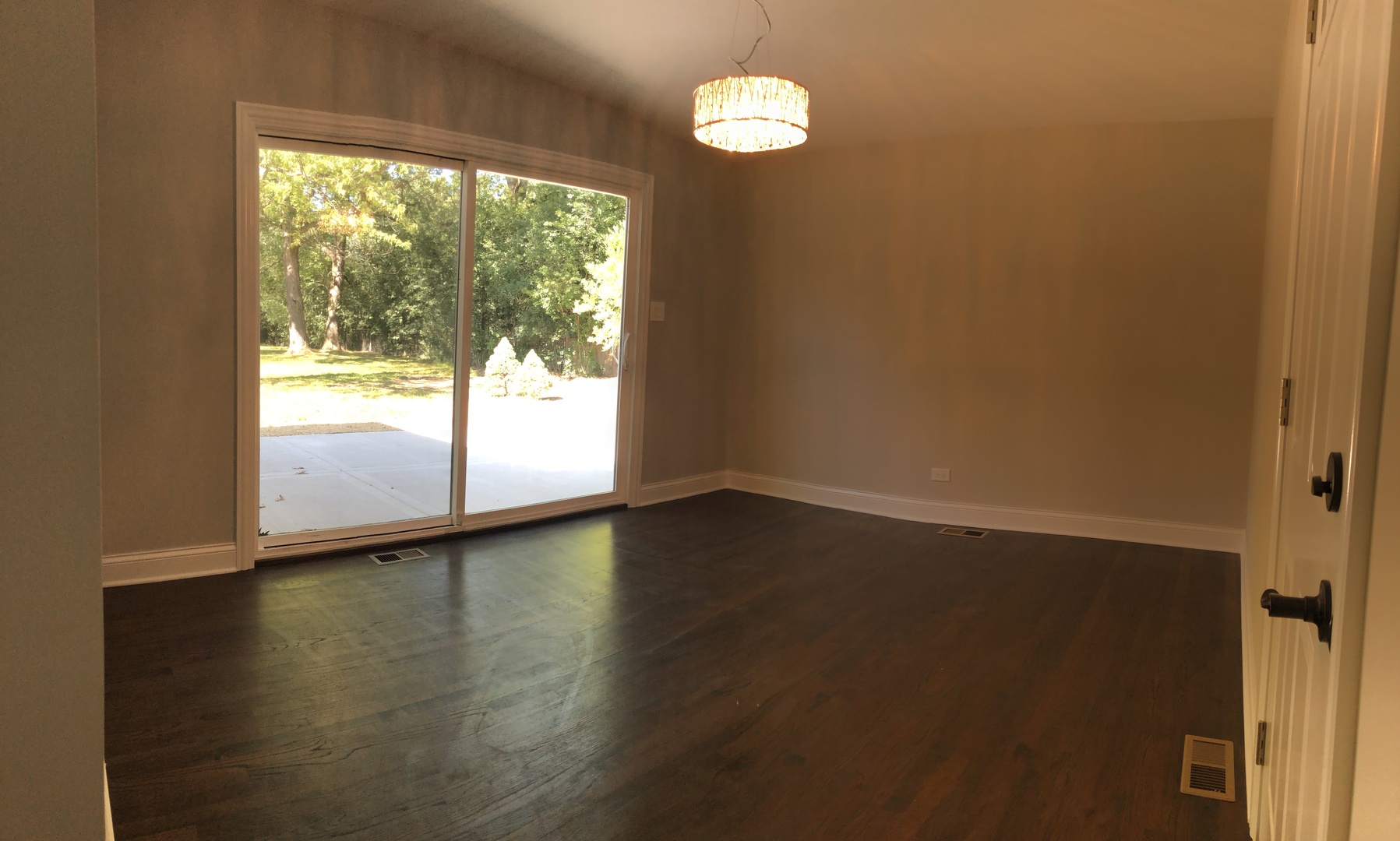 2640 Deerfield Road Riverwoods, IL 60015 - Photo 8 of 15 a view of an empty room with wooden floor and a window