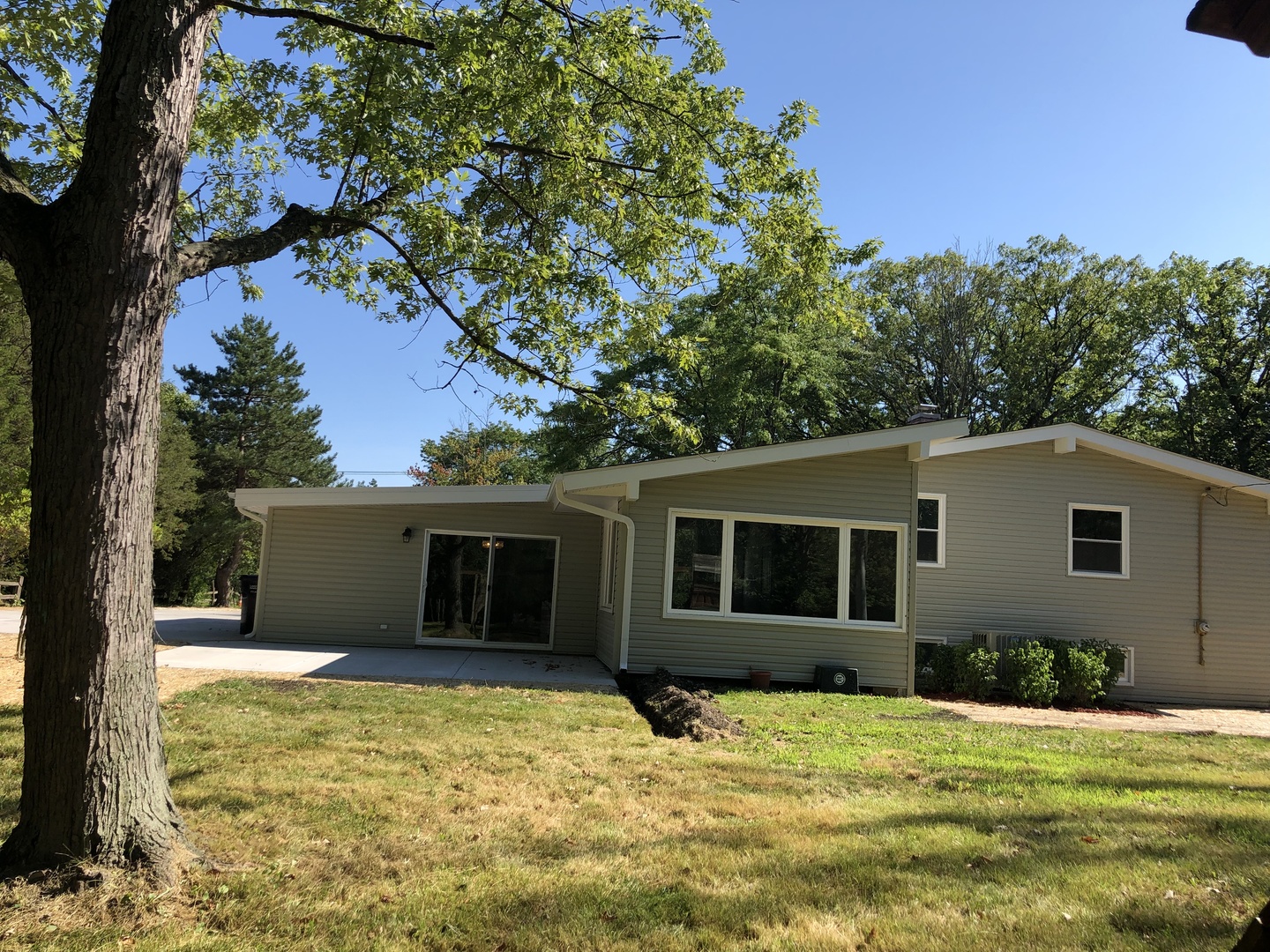 2640 Deerfield Road Riverwoods, IL 60015 - Photo 10 of 15 a house with trees in the background