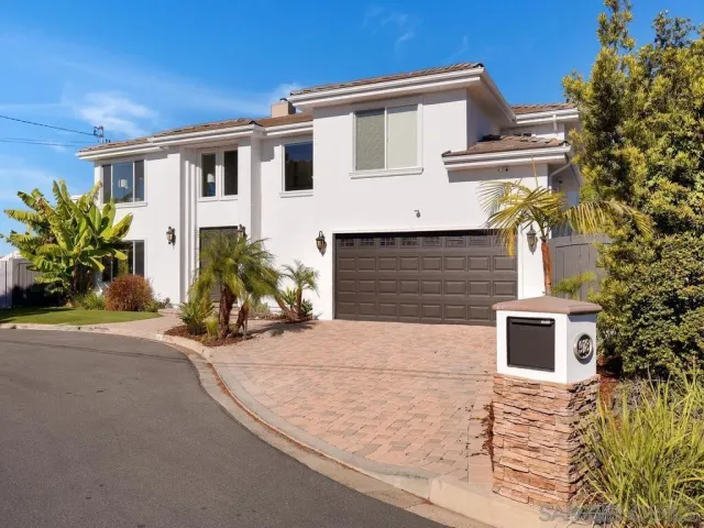 a view of a house with a patio